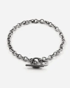 BRACCIALE CATENA RIGATA CON T-BAR PUNTINATA IN ARGENTO