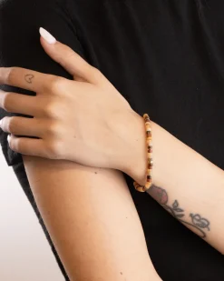 BRACCIALE CILINDRI MARRONI PLACCATO ORO