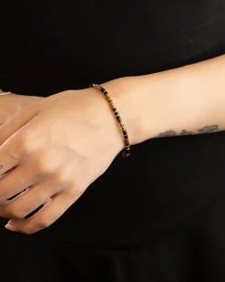 BRACCIALE CILINDRI MINI MARRONI PLACCATO ORO