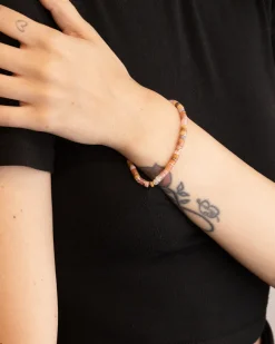 BRACCIALE CILINDRI ROSA PLACCATO ORO