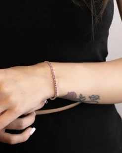 BRACCIALE TENNIS IN ARGENTO CON PIETRE FUCSIA CABOCHON