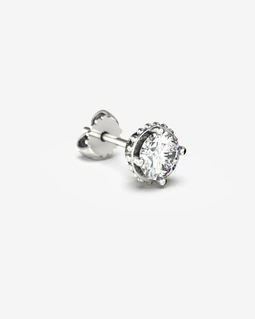 ORECCHINO PUNTO LUCE IN ORO CON DIAMANTE DA 0.7 ct